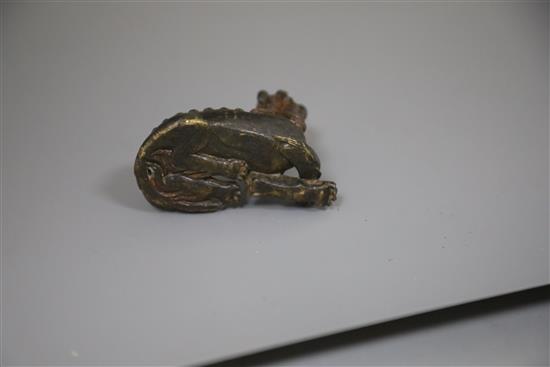 A Chinese bronze mythical beast scroll weight, 17th / 18th century, L.7.2cm